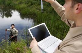 Environmental scientists analyze samples in wetlands, among other tasks..